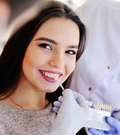 Young woman at a consultation for dental veneers in New York